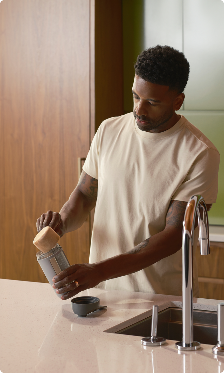 A man preparing food in his kitchen